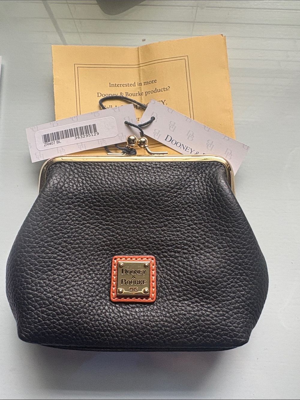 Dooney & Bourke Black Pebbled Leather Kiss-Lock Coin Pouch with Gold Hardware